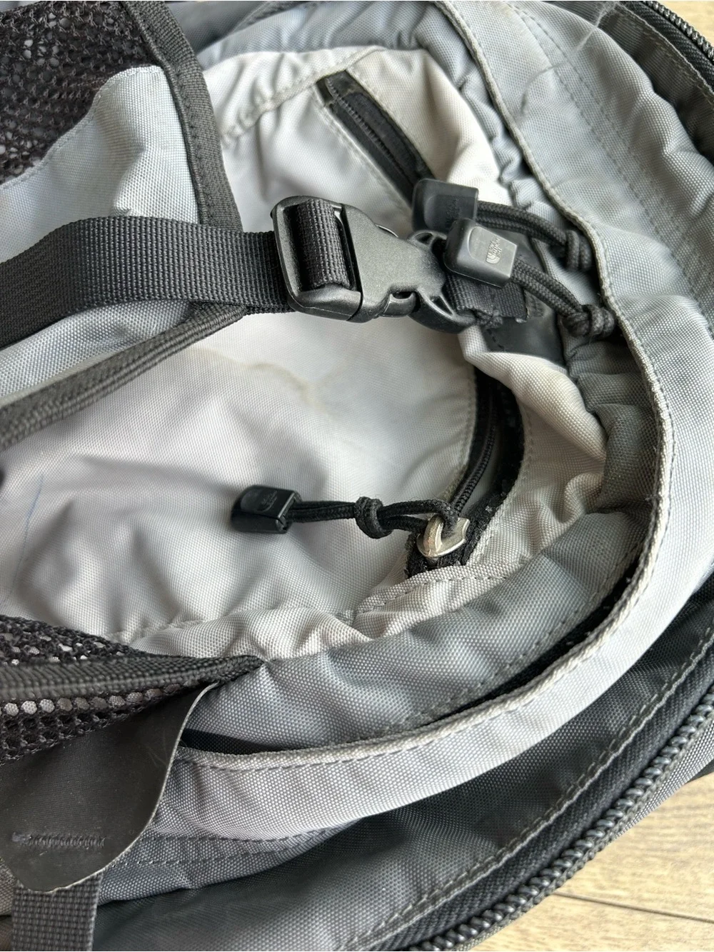 The North Face Gray and Black Backpack with Mesh Pockets